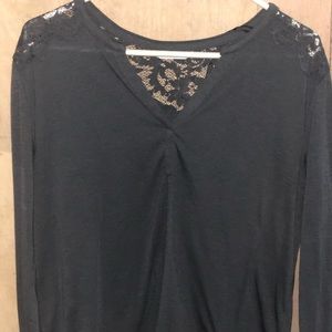 I am selling a gray long sleeve shirt.
